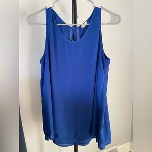 Royal blue sleeveless blouse with faux back opening